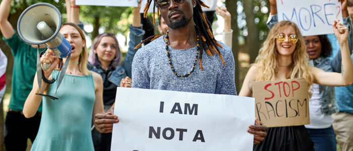 diverse americans protest anti-black racism and police brutality.